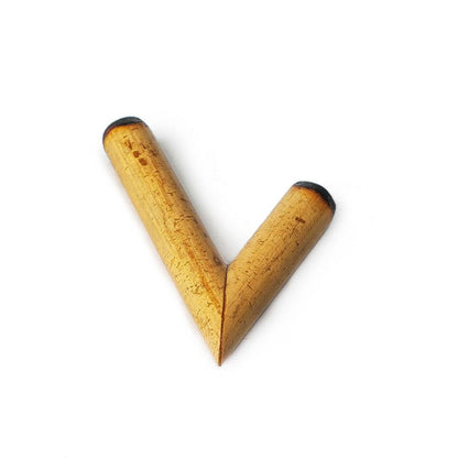 A single bamboo kuripe snuff pipe on a white background