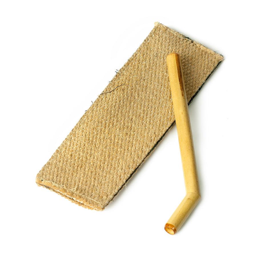 Bamboo tepi with its' burlap sack on a white background